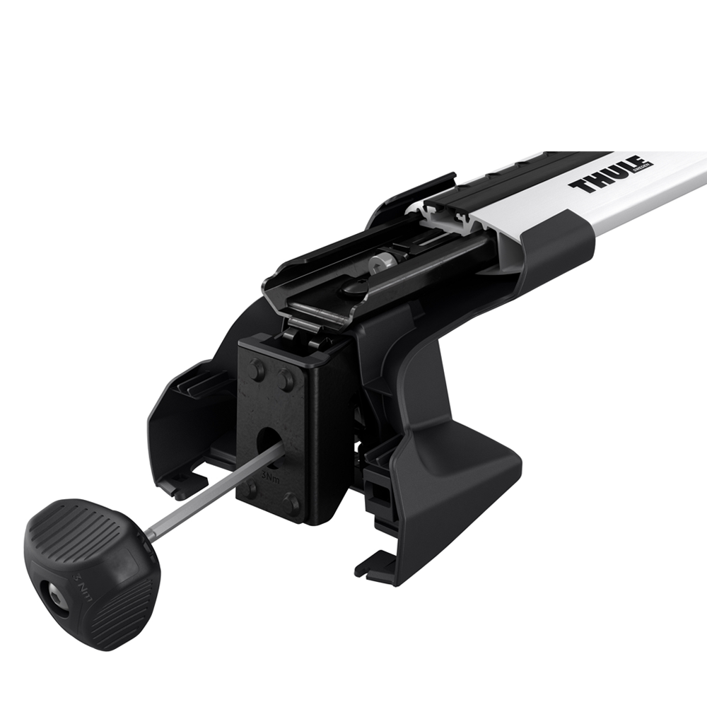 Close-up of Thule WingBar Edge roof bar and 7205 foot pack with torque key
